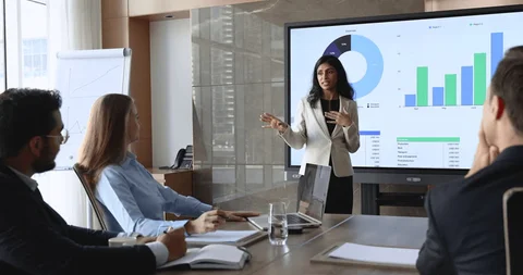 A founder presenting a business plan to a small panel